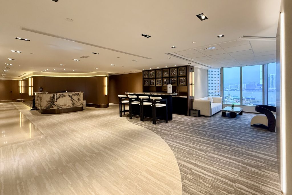 office lounge with bar table and lounge sofa and reception desk